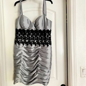 Brand new Formal dress with cover- never worn.  The zipper needs to be repaired.